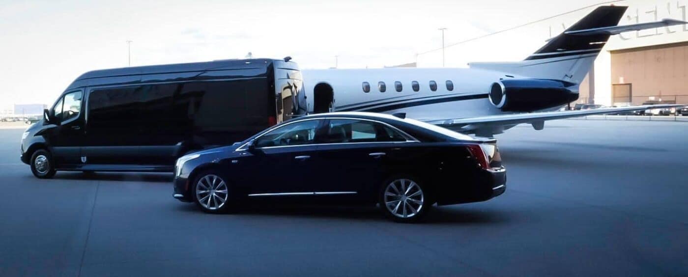 platinum party bus limo's pickup a client at a private airport.